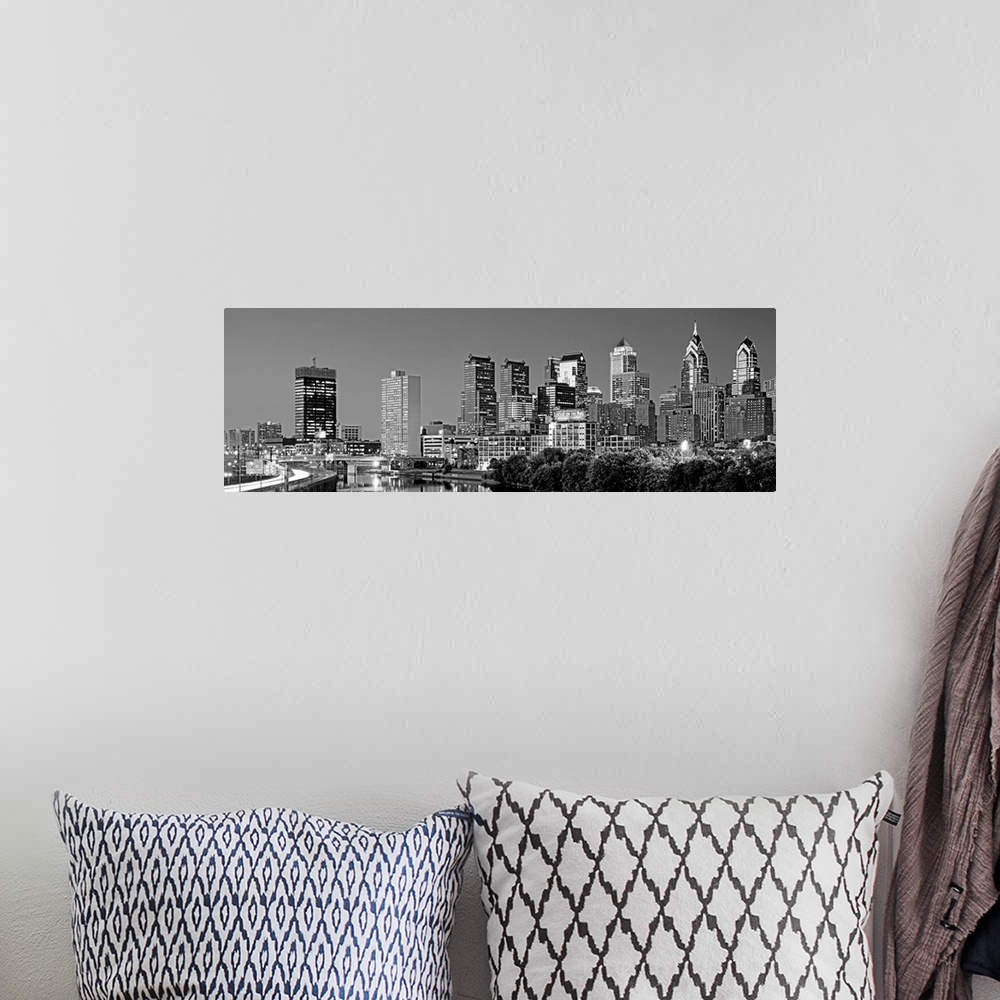A bohemian room featuring This panoramic photographs shows the City of Brotherly Love a night.