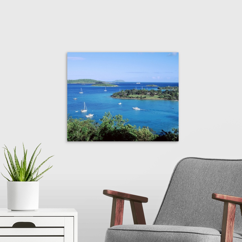 A modern room featuring Large photo on canvas of sail boats in a bay in the ocean.