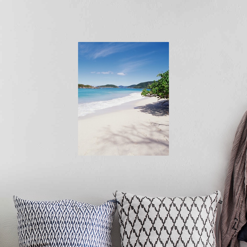 A bohemian room featuring This decorative accent is a vertical photograph of the tropical sky and sandy beach.