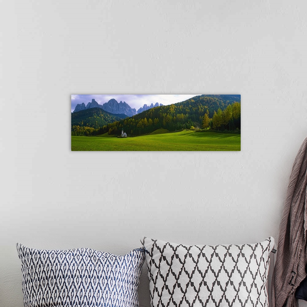 A bohemian room featuring Valley with a church and mountains in the background, Santa Maddalena, Val De Funes, Le Odle, Dol...
