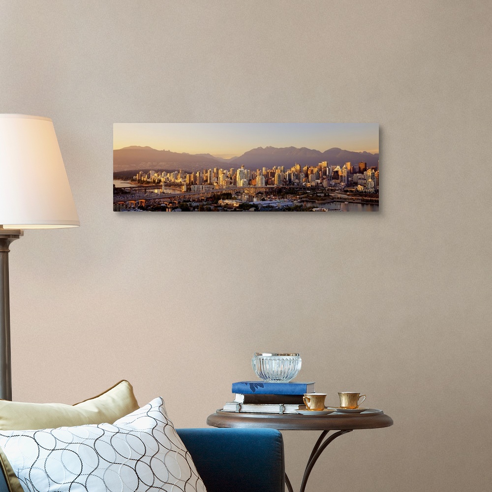 A traditional room featuring Cityscape panorama of Vancouver Canada with the harbor and bridges in the foreground going to Van...