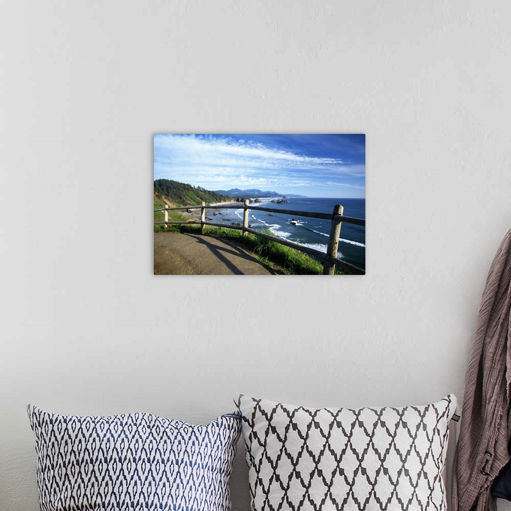 A bohemian room featuring This photograph is taken from a walking trail while looking out at the coast in Oregon with rock ...