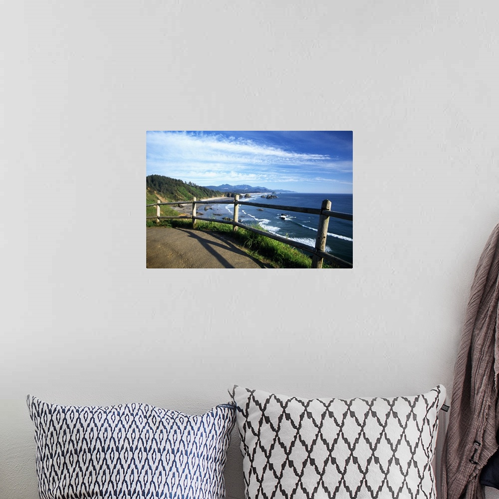 A bohemian room featuring This photograph is taken from a walking trail while looking out at the coast in Oregon with rock ...