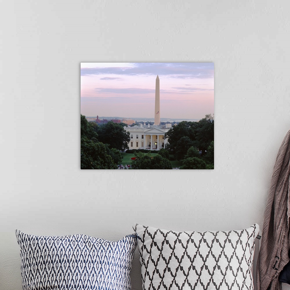 A bohemian room featuring Giant landscape photograph on a large wall hanging looking over tree tops at the White House and ...