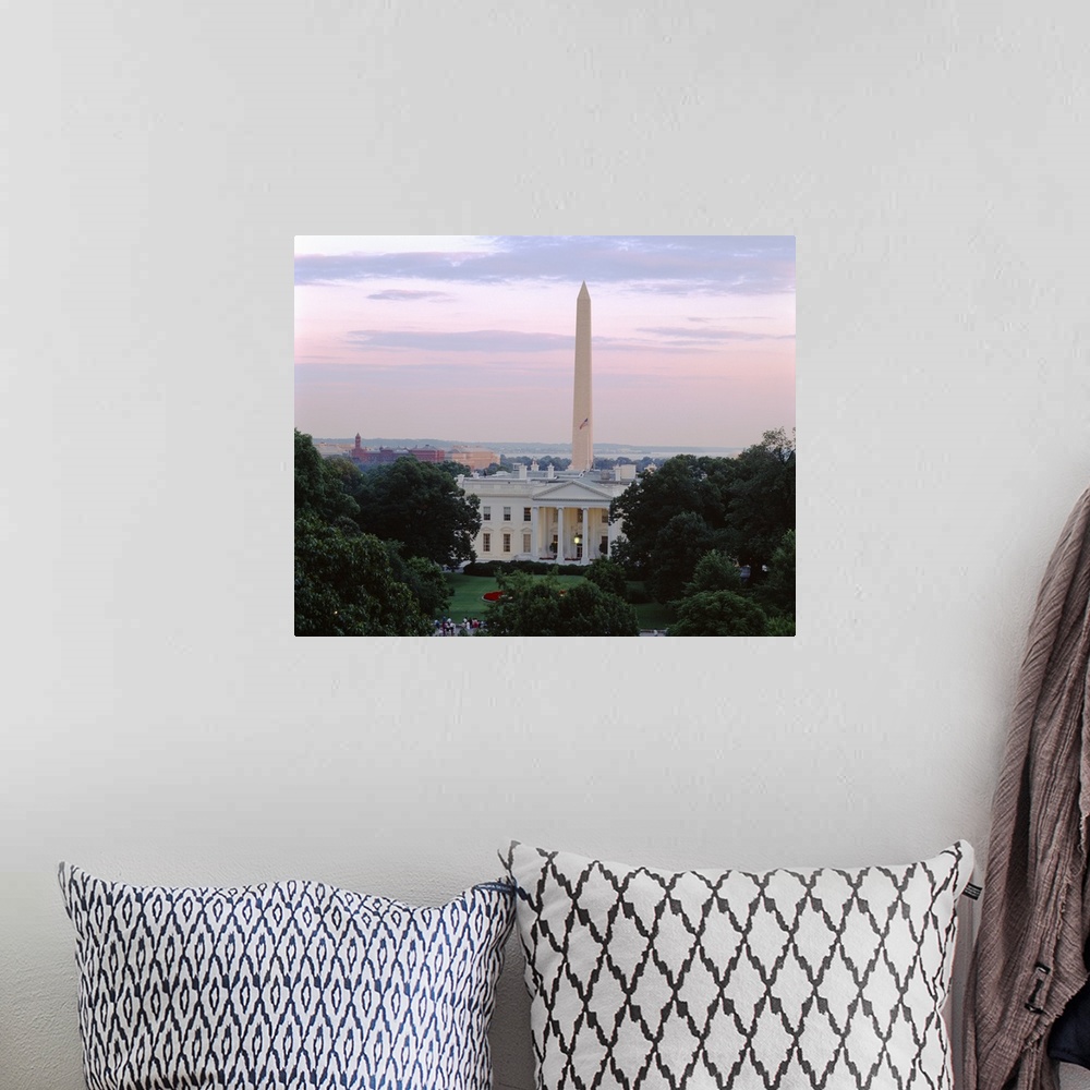 A bohemian room featuring Giant landscape photograph on a large wall hanging looking over tree tops at the White House and ...