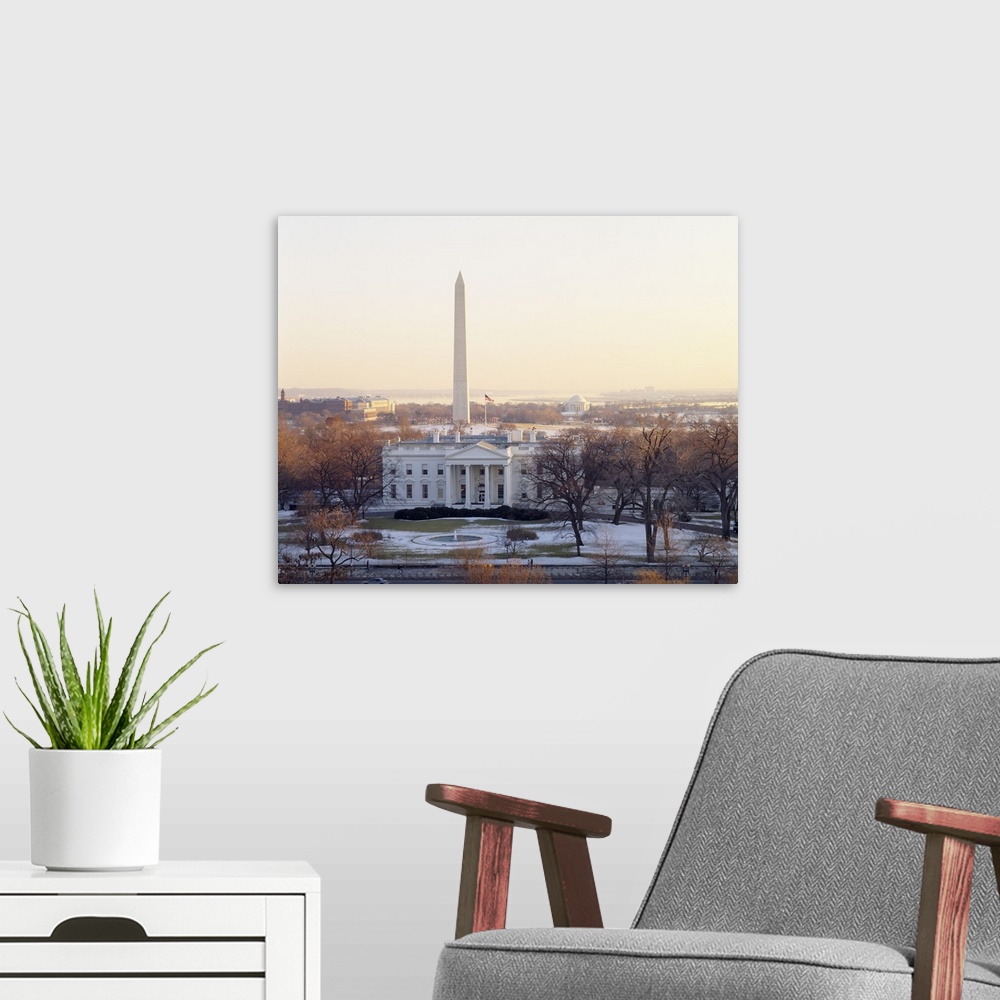 A modern room featuring View of the White House and Washington Monument at sunset, Washington DC