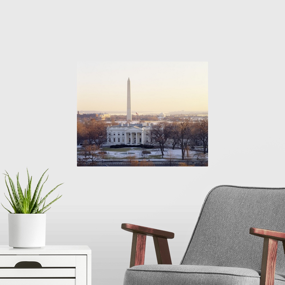 A modern room featuring View of the White House and Washington Monument at sunset, Washington DC