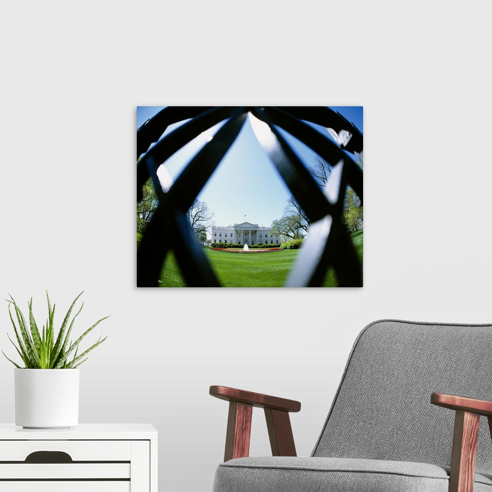 A modern room featuring View of the White House through a diamond shape in the fence, Washington DC