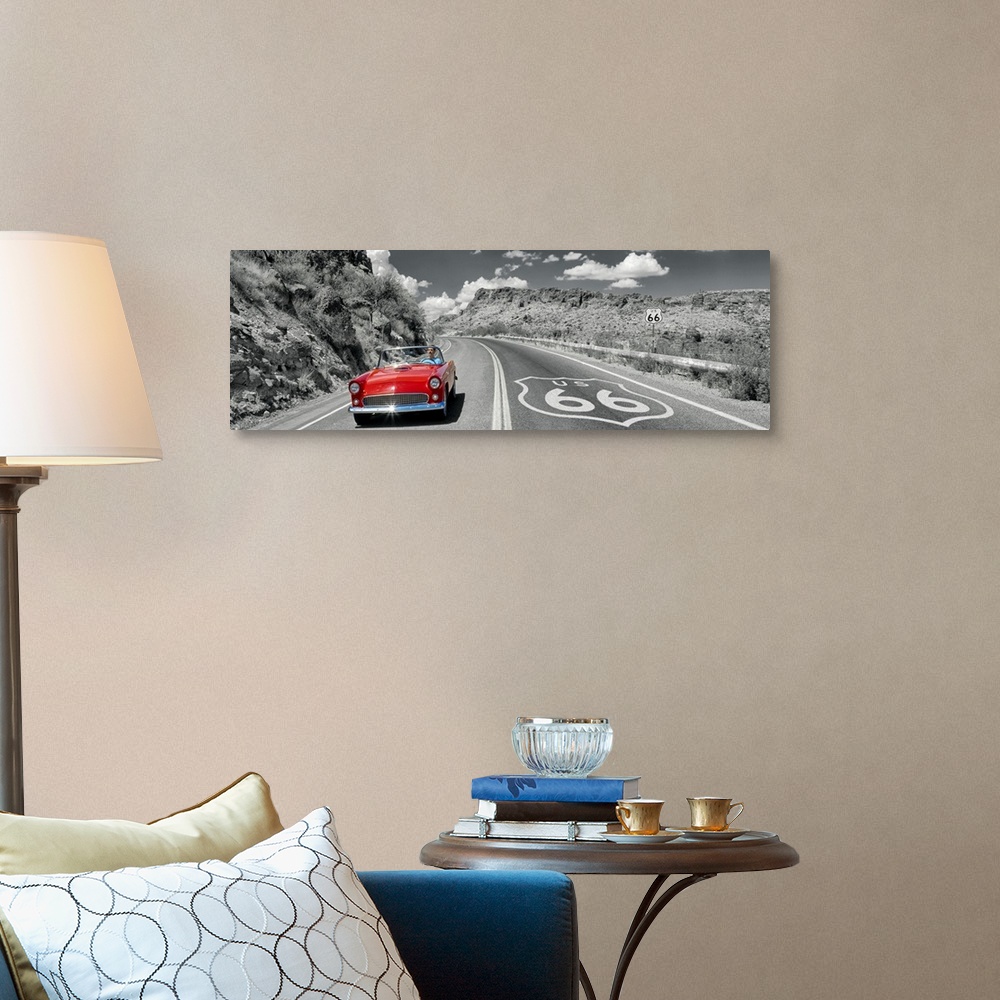 A traditional room featuring Panoramic photograph displays a classic car cruising down a highway with rocky canyons on both si...