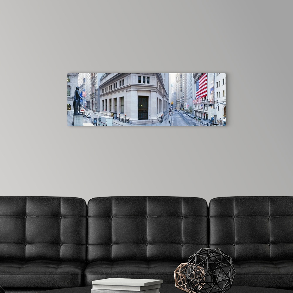 A modern room featuring Panoramic photo of a major financial district in NYC with a big American flag hanging outside of ...
