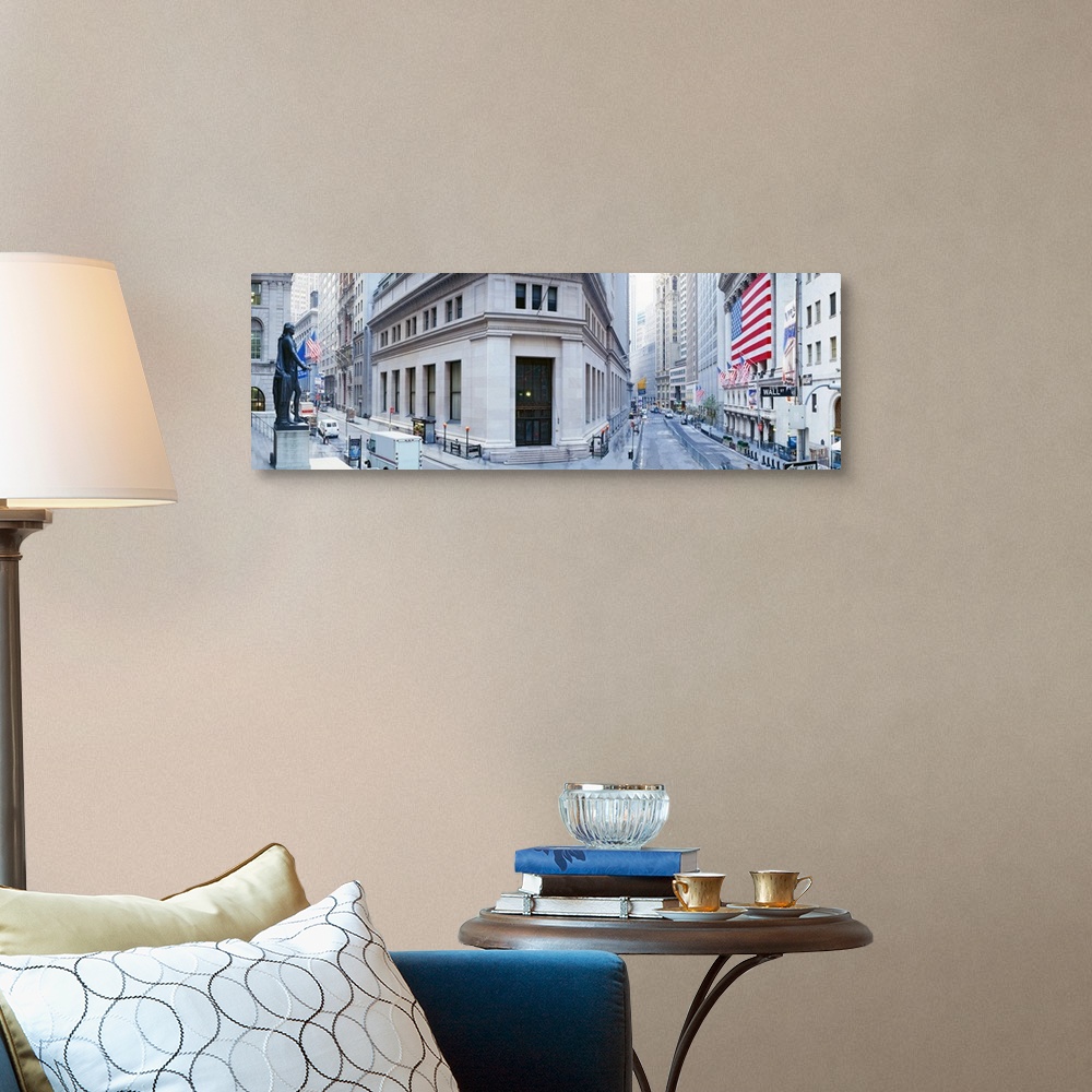 A traditional room featuring Panoramic photo of a major financial district in NYC with a big American flag hanging outside of ...
