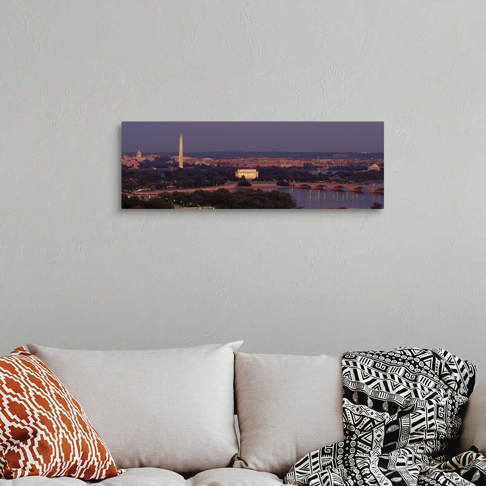 A bohemian room featuring Wide angle, aerial photograph of Washington DC at night, including the Washington Monument, the C...