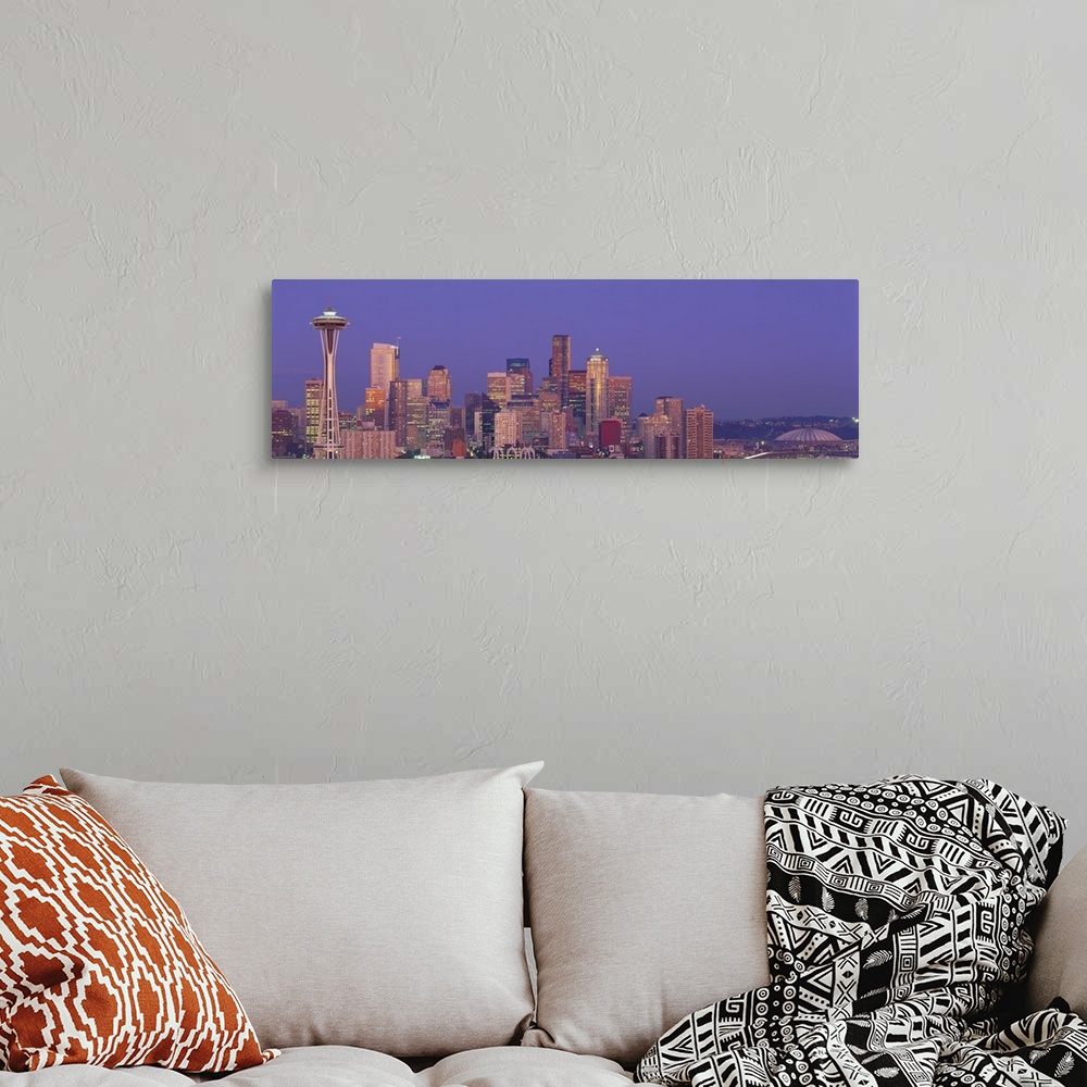 A bohemian room featuring Panoramic photograph of lit up skyline at dusk with iconic buildings such as the Space Needle, Co...