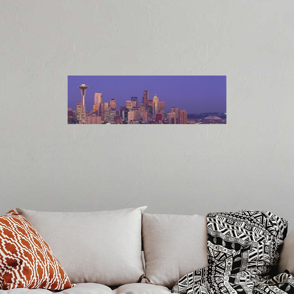 A bohemian room featuring Panoramic photograph of lit up skyline at dusk with iconic buildings such as the Space Needle, Co...