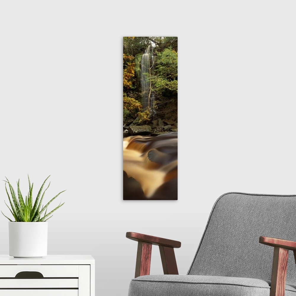 A modern room featuring Water falling on rocks, Mallyan Spout, West Beck, Goathland, North Yorkshire, England