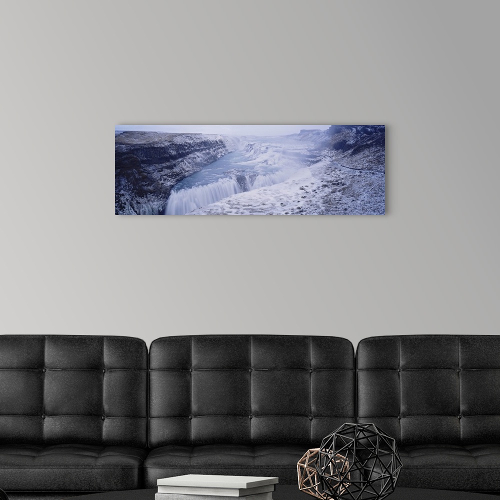 A modern room featuring Water flowing through snow covered mountains, Gullfoss Falls, Vesturland, Iceland