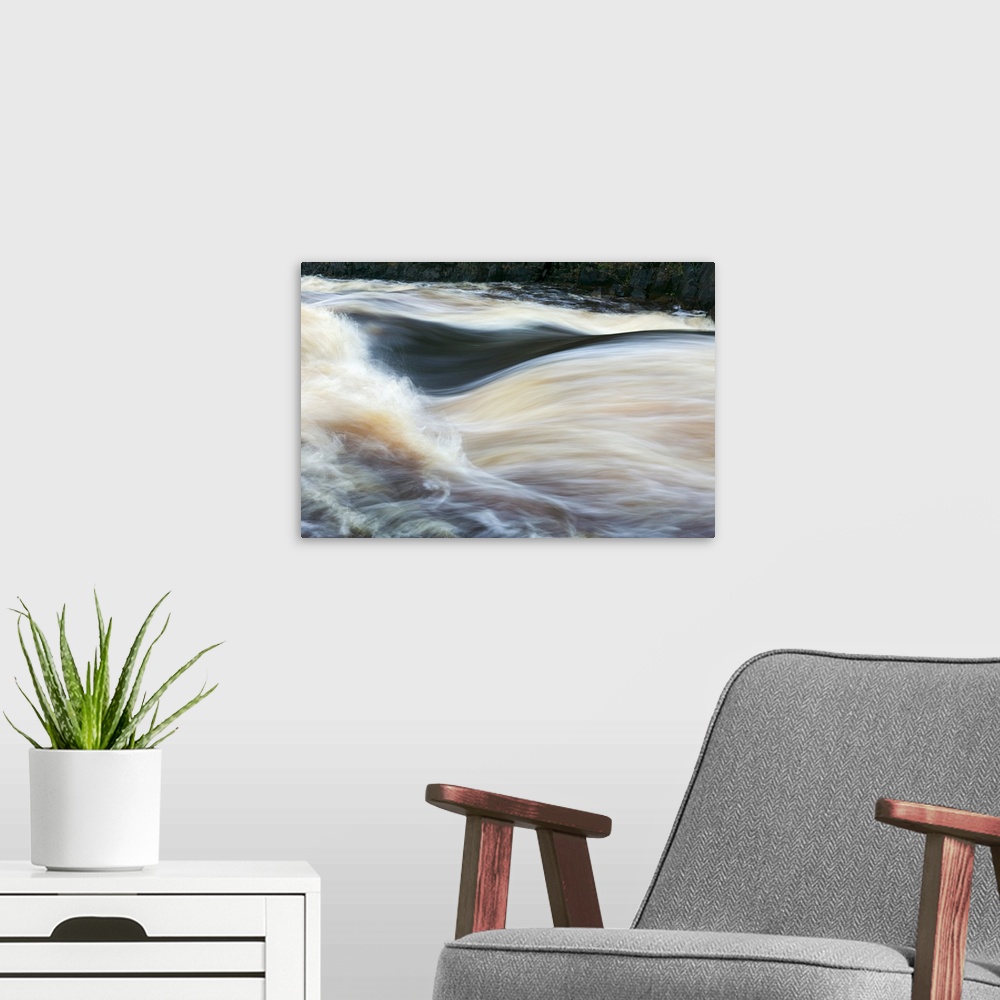A modern room featuring Water rushing on Rapid River, close up, Minnesota