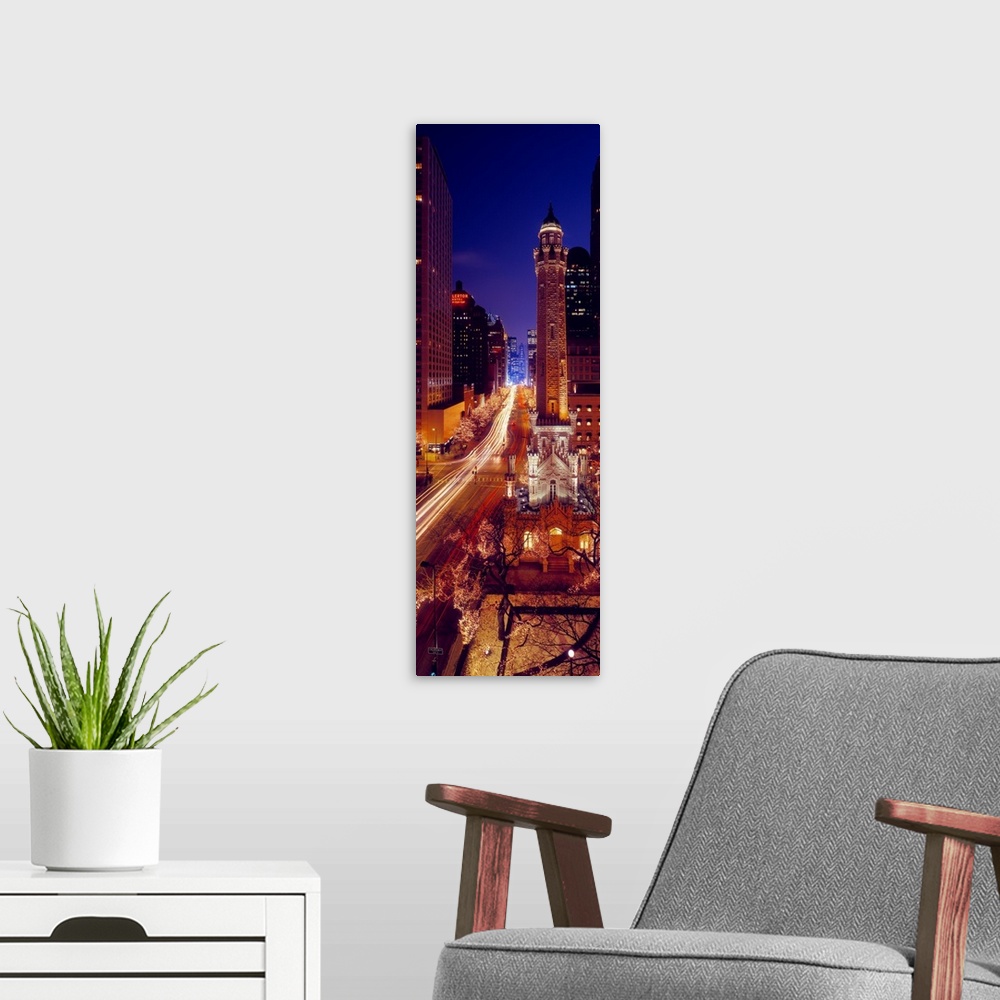A modern room featuring Buildings lit up at night, Water Tower, Magnificent Mile, Michigan Avenue, Chicago, Cook County, ...