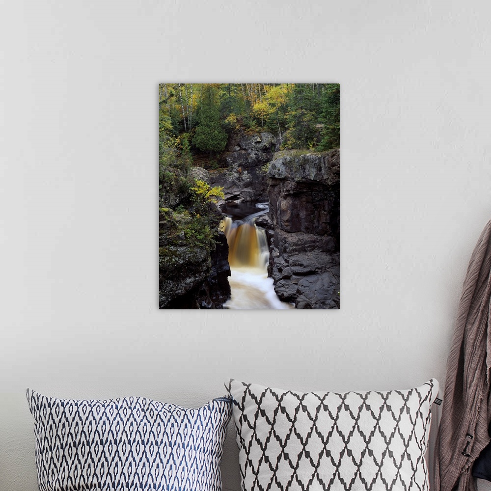 A bohemian room featuring Waterfall and black cliffs along Temperance River, Temperance River State Park, Minnesota