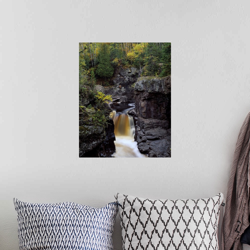 A bohemian room featuring Waterfall and black cliffs along Temperance River, Temperance River State Park, Minnesota