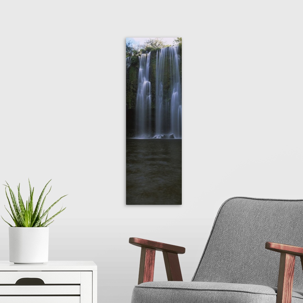 A modern room featuring Waterfall in a forest, Llanos De Cortez Waterfall, Guanacaste Province, Costa Rica