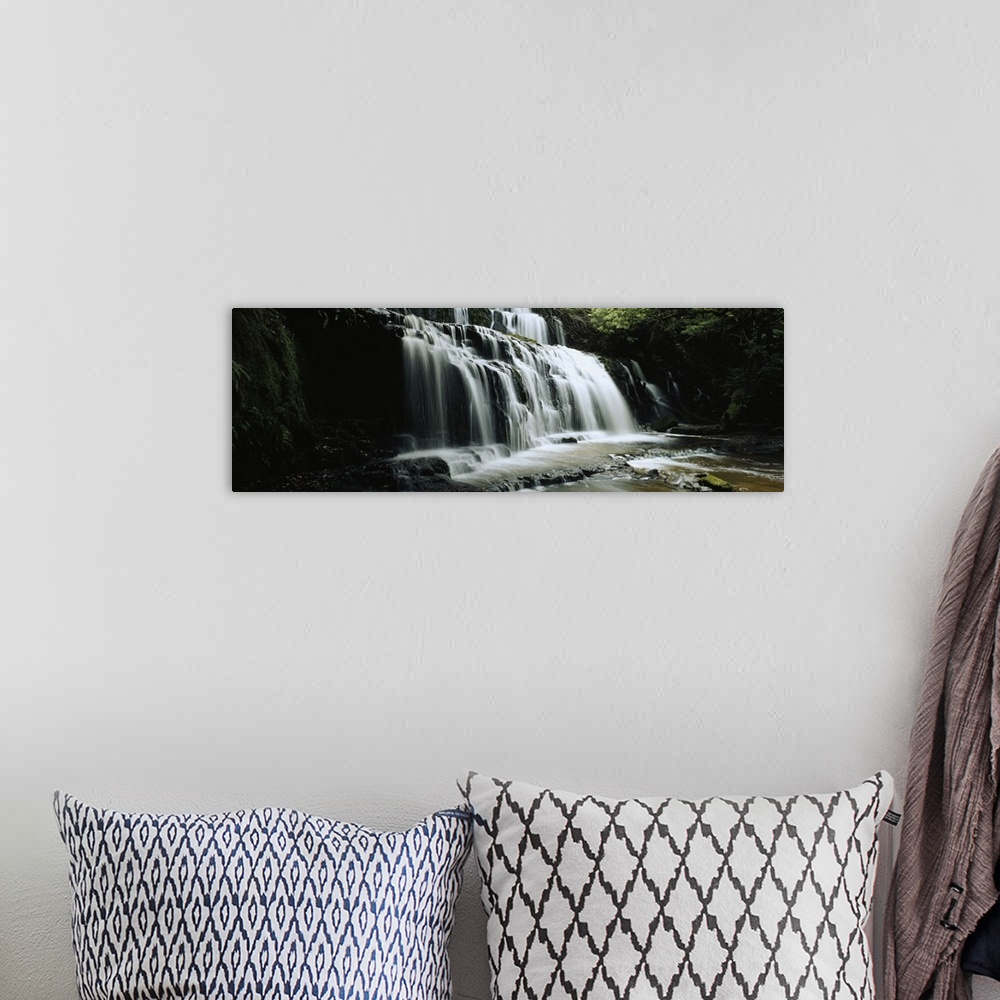 A bohemian room featuring Waterfall in a forest, Purakaunui Falls, The Catlins, South Island, New Zealand