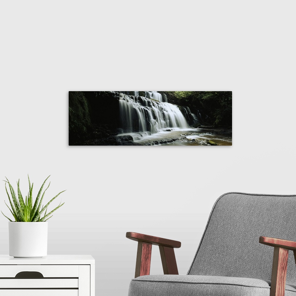 A modern room featuring Waterfall in a forest, Purakaunui Falls, The Catlins, South Island, New Zealand