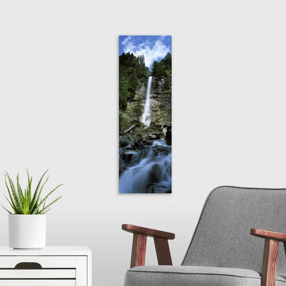 A modern room featuring Waterfall in a forest Tatschbachfall Engelberg Obwalden Canton Switzerland