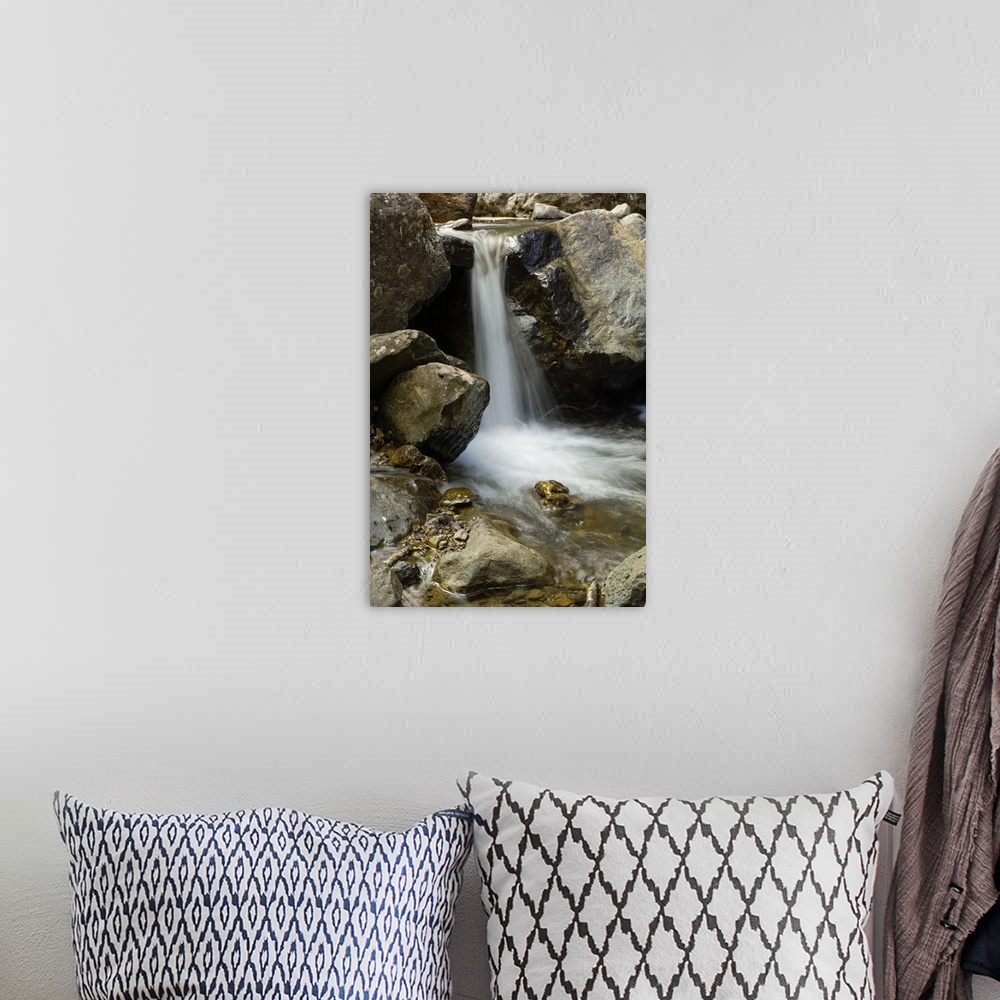 A bohemian room featuring Waterfall On Rocky Mina Creek