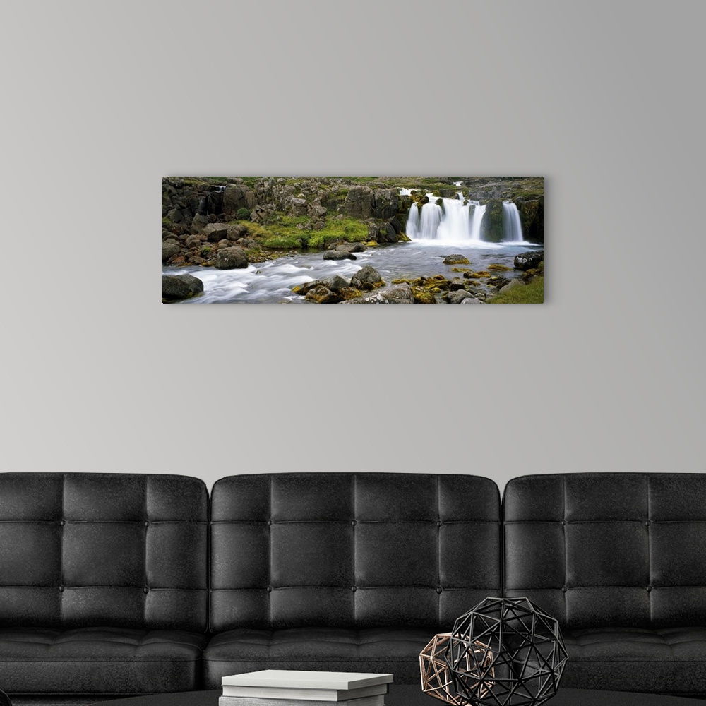 A modern room featuring Waterfall on rocky stream, Iceland