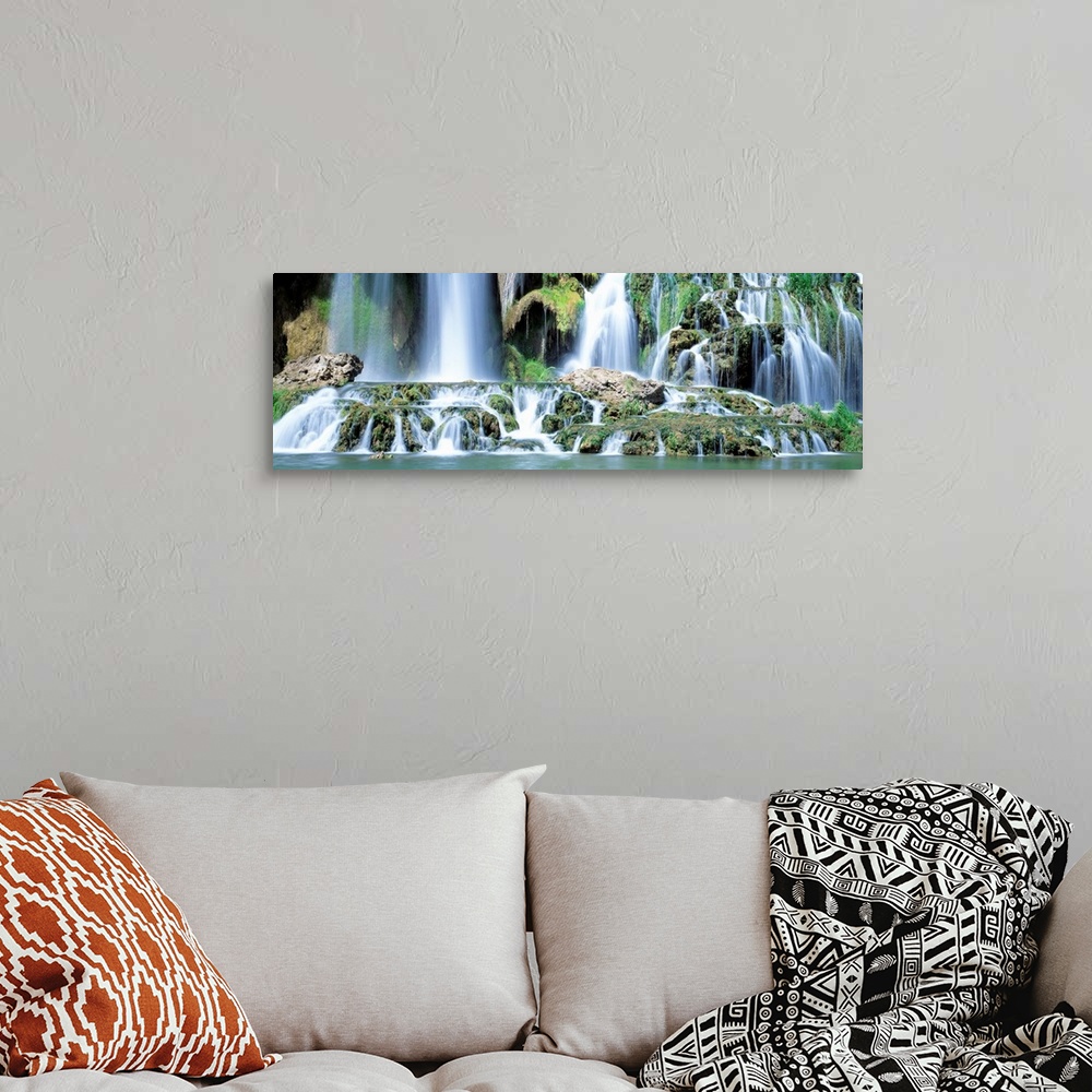 A bohemian room featuring Serene wall art for the home or office a panoramic photograph of the bottom of a rocky waterfall ...