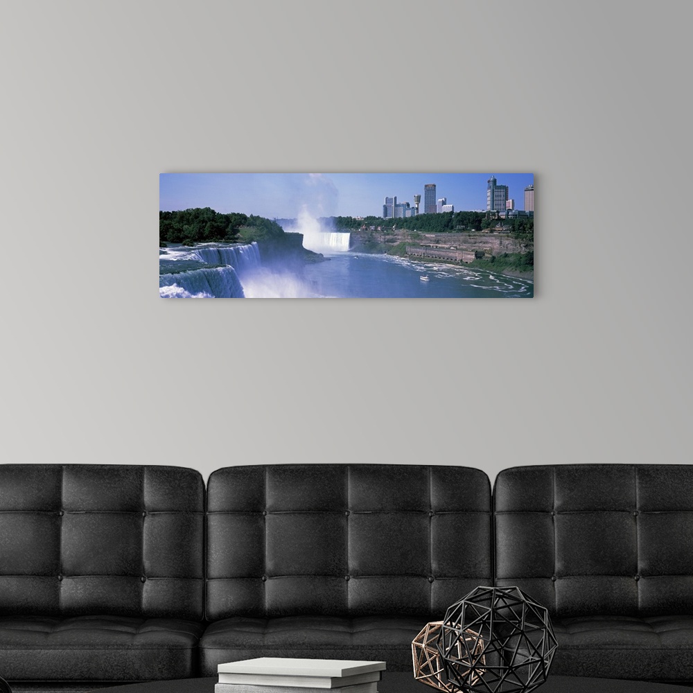 A modern room featuring Panoramic photograph of the three waterfalls that straddle the international border between Canad...