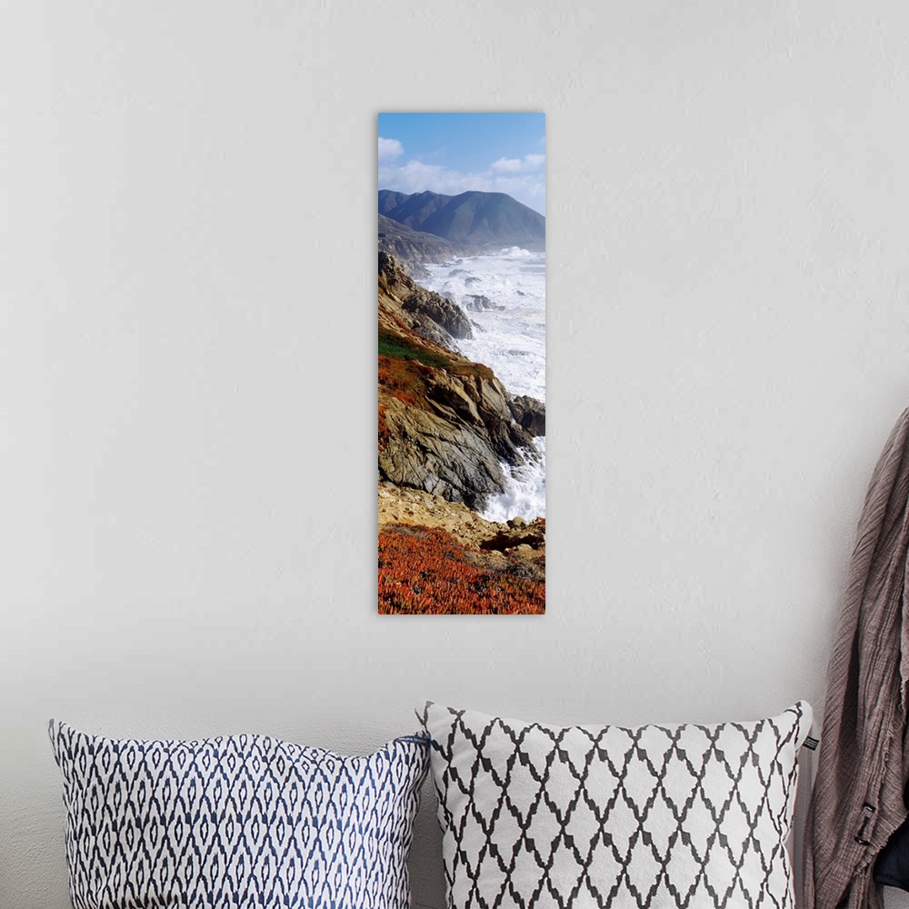 A bohemian room featuring Giant vertical panoramic print of the ocean crashing up against cliffs in Big Sur, Carmel, Monter...