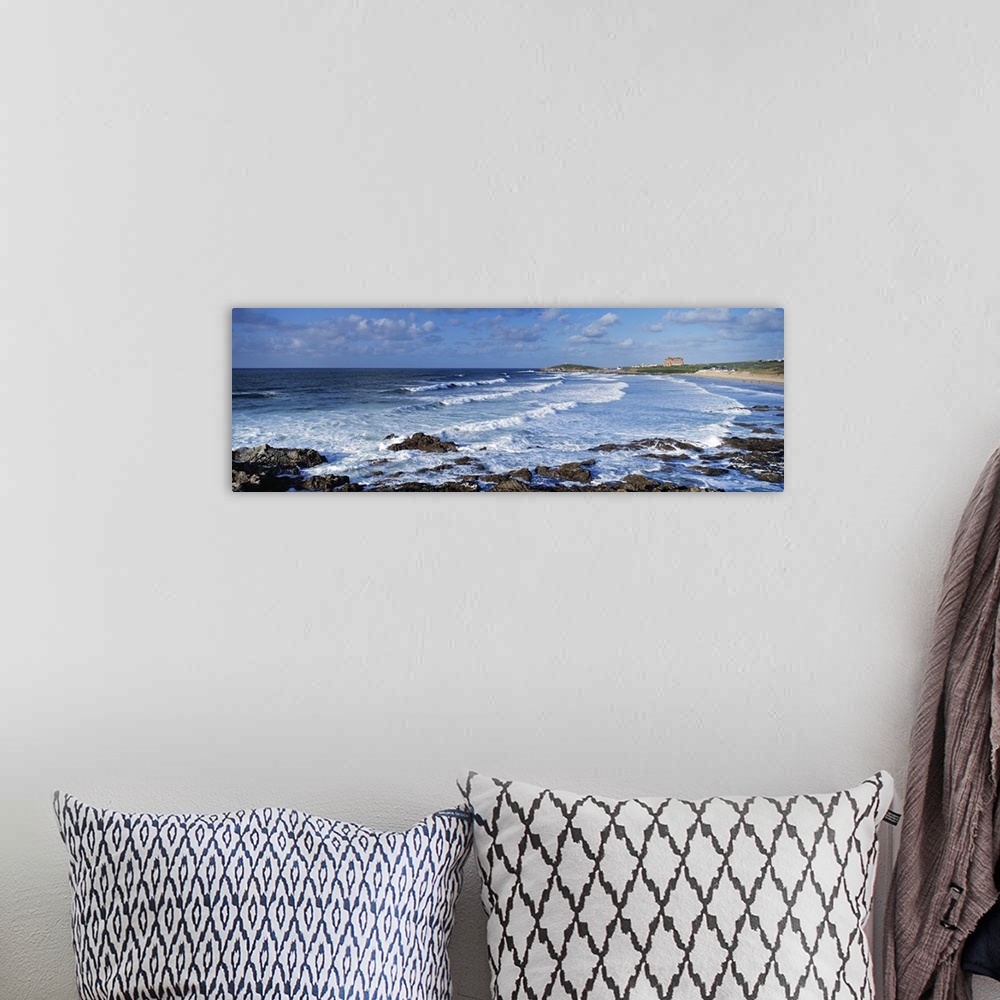 A bohemian room featuring Waves in the ocean Fistral Beach Cornwall England