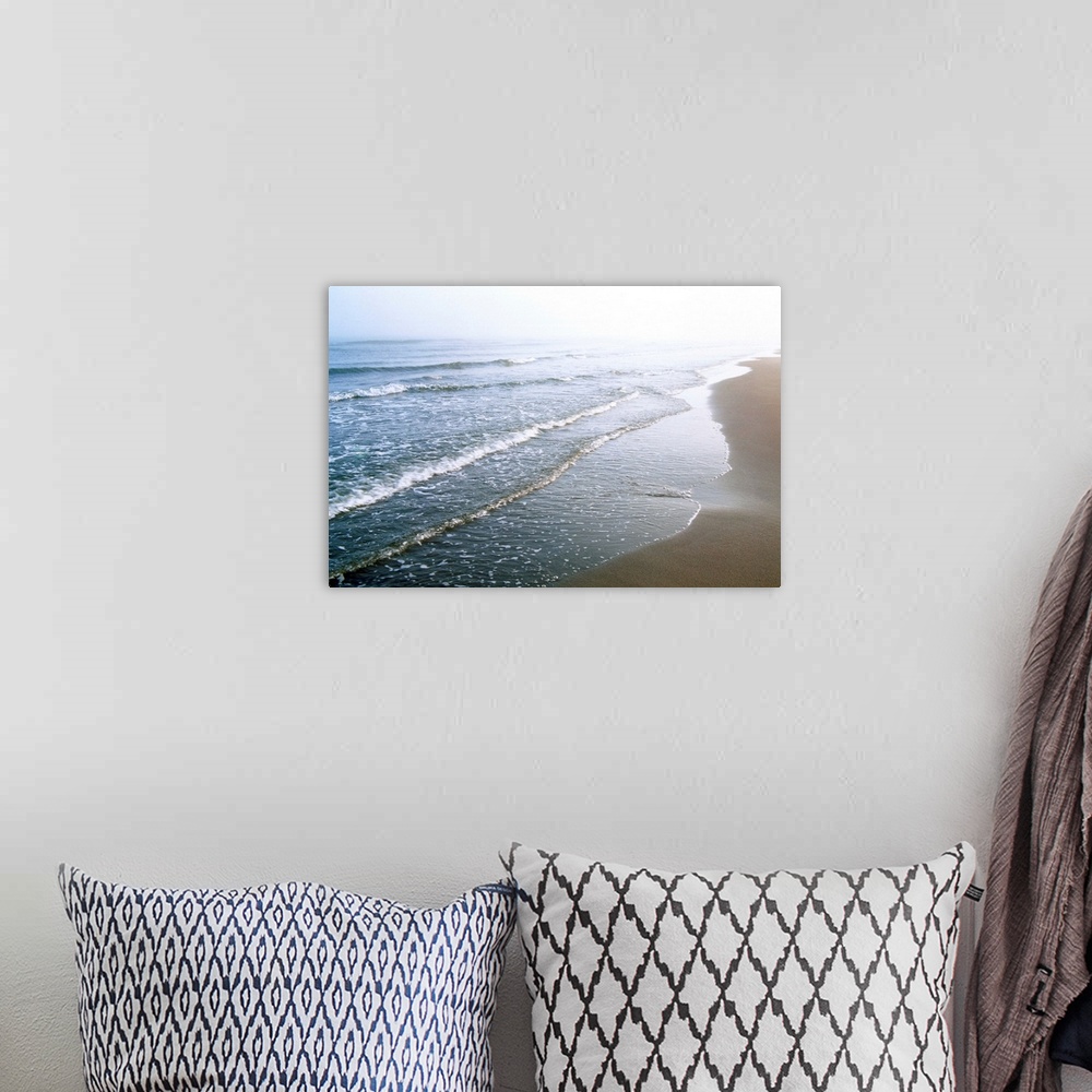 A bohemian room featuring Waves on beach