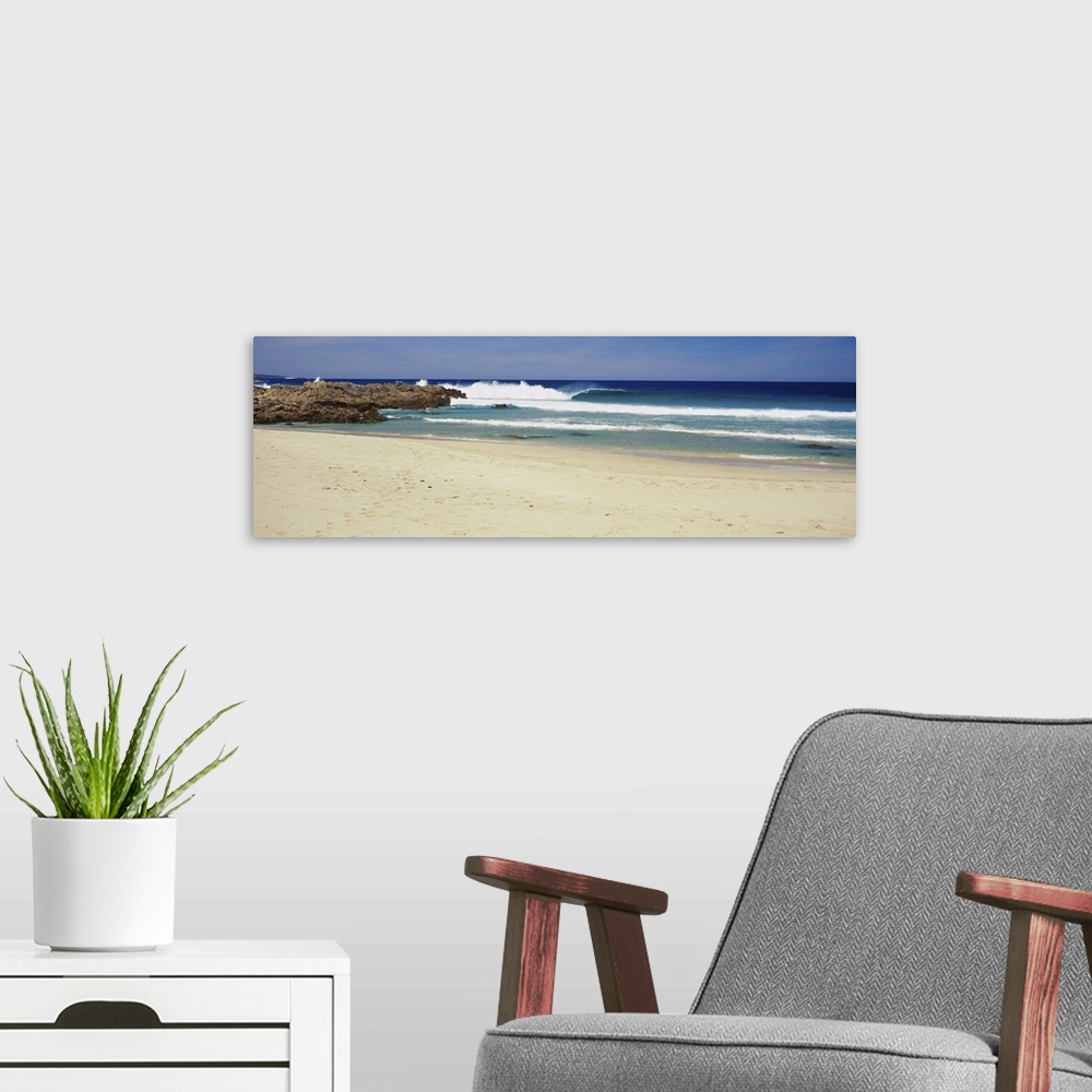 A modern room featuring Waves on the beach, Australia