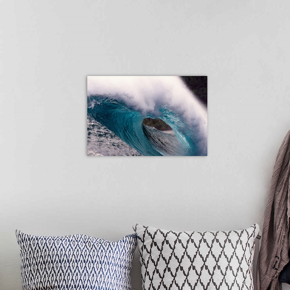 A bohemian room featuring Wave breaking in the sea