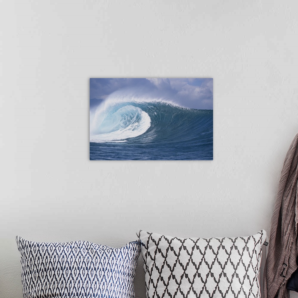 A bohemian room featuring Waves splashing in the sea