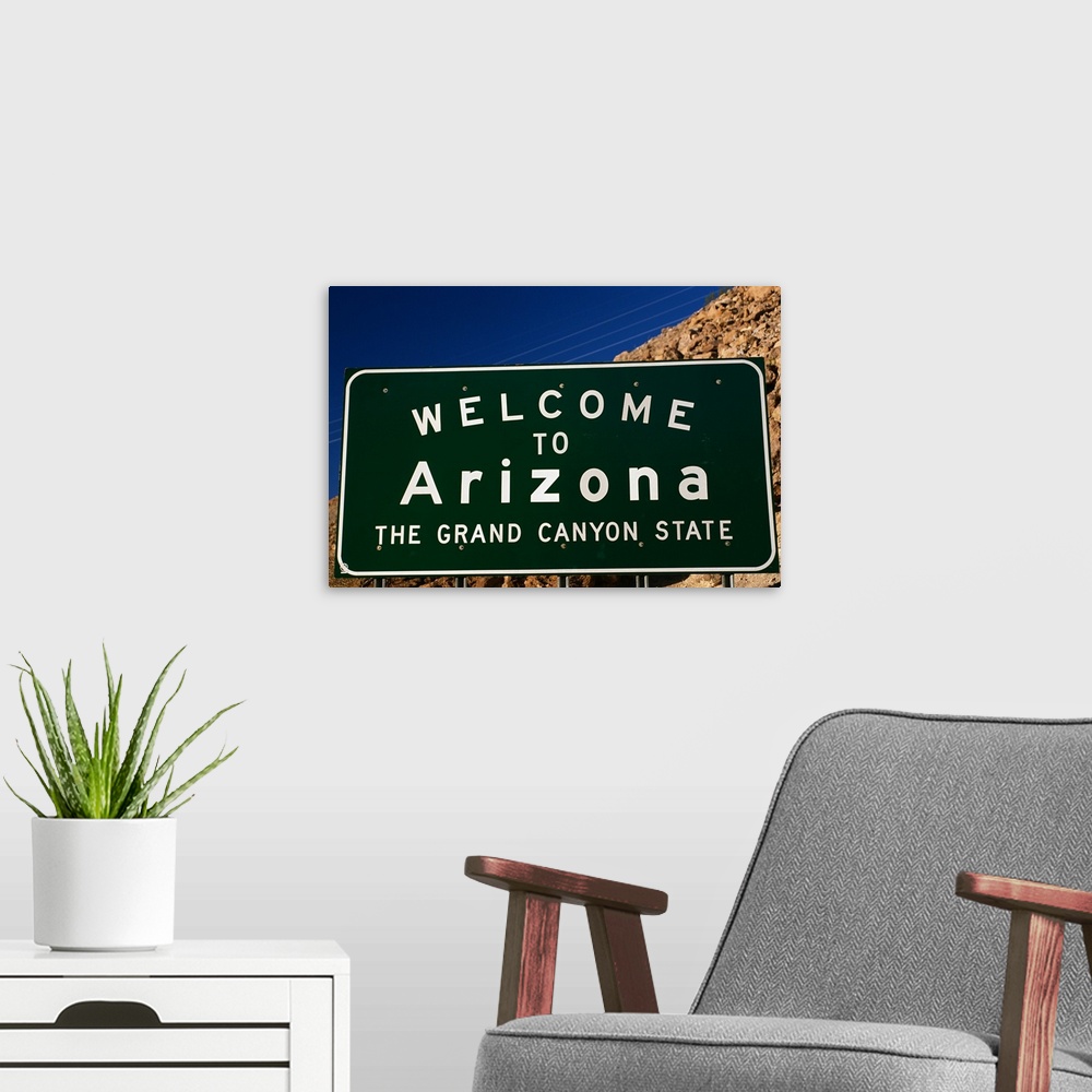 A modern room featuring Welcome to Arizona State Sign
