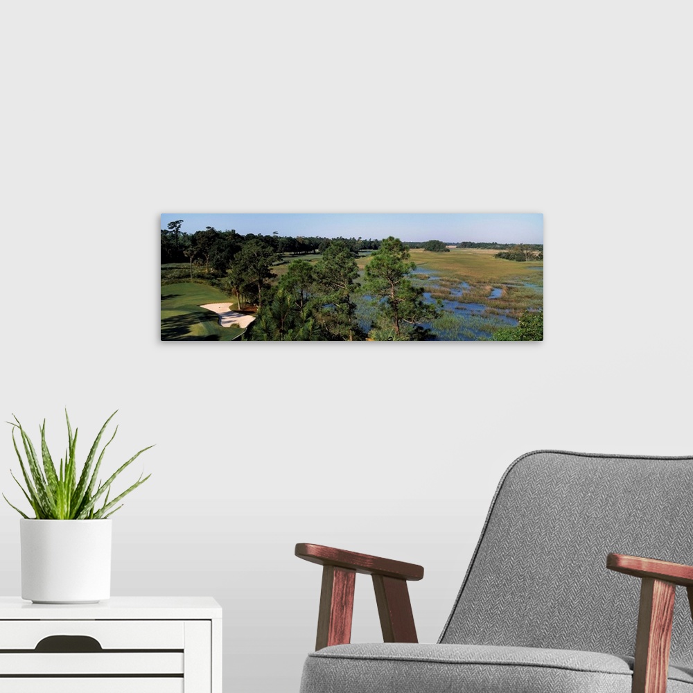 A modern room featuring Wetlands in a golf course, Cougar Point, Kiawah Island Golf Resort, Kiawah Island, Charleston Cou...