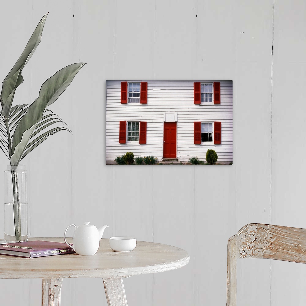 A farmhouse room featuring White House with Red Door and Shutters
