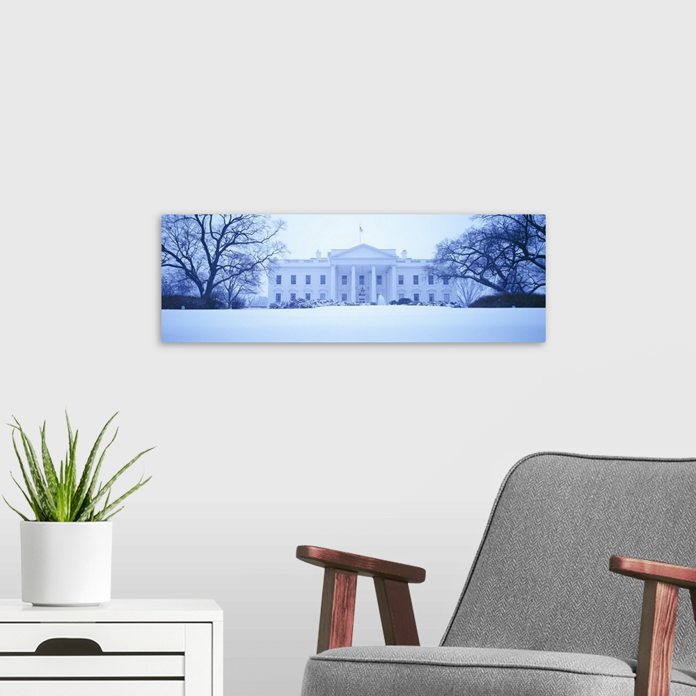 A modern room featuring White House with snow at dusk, Washington DC
