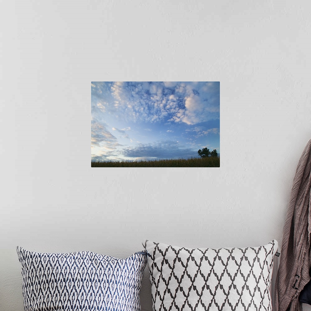 A bohemian room featuring Wide angle view of clouds over silhouetted field, Iowa