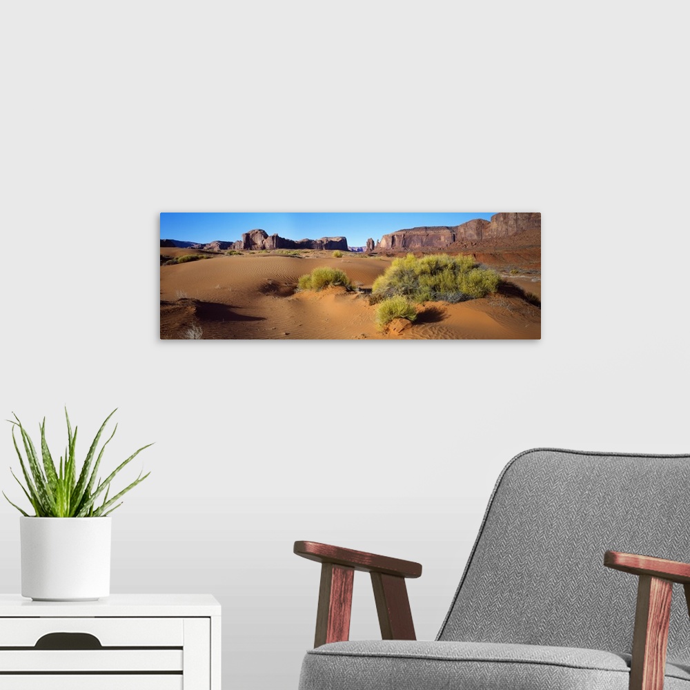 A modern room featuring Wide angle view of Monument Valley Tribal Park, Utah