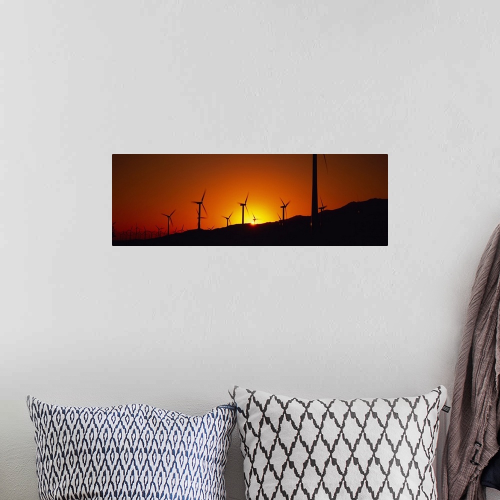 A bohemian room featuring Wind turbines at dusk, Palm Springs, California