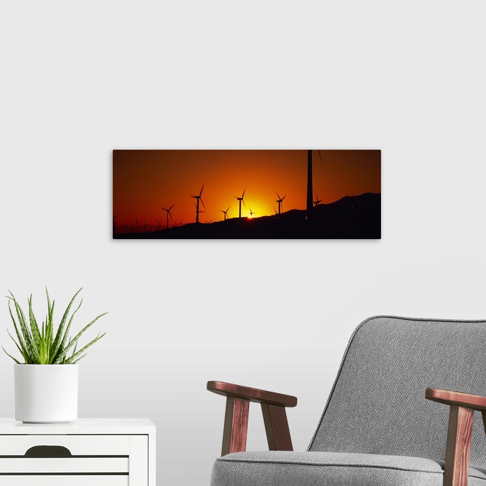 A modern room featuring Wind turbines at dusk, Palm Springs, California