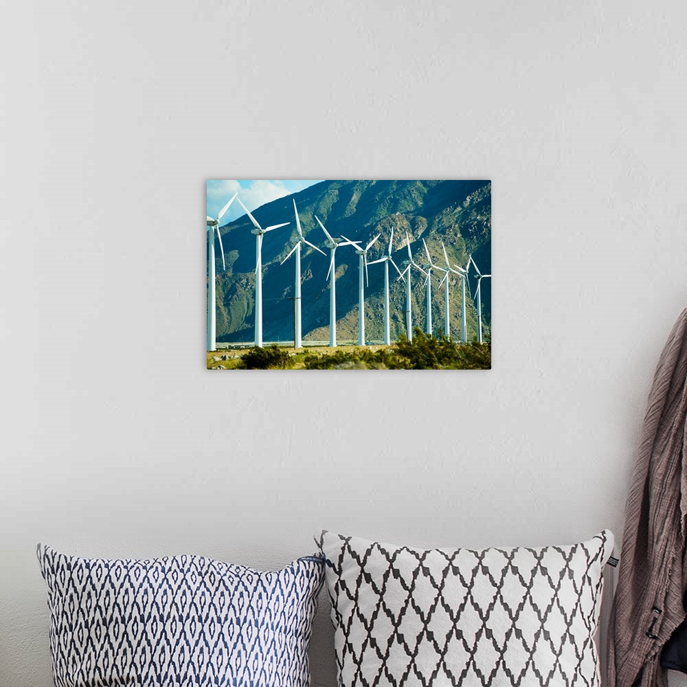 A bohemian room featuring Wind turbines in front of a mountain, Palm Springs, California