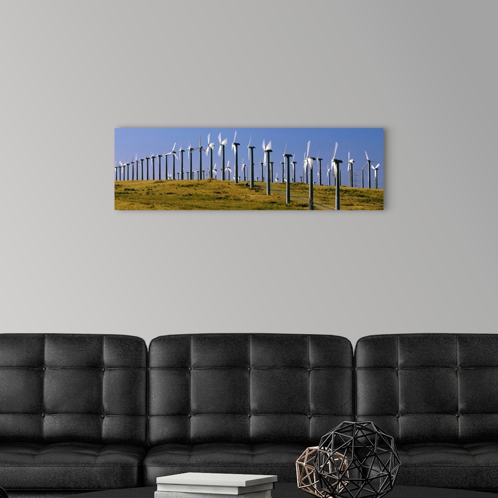 A modern room featuring Wind turbines on a landscape, Livermore, California