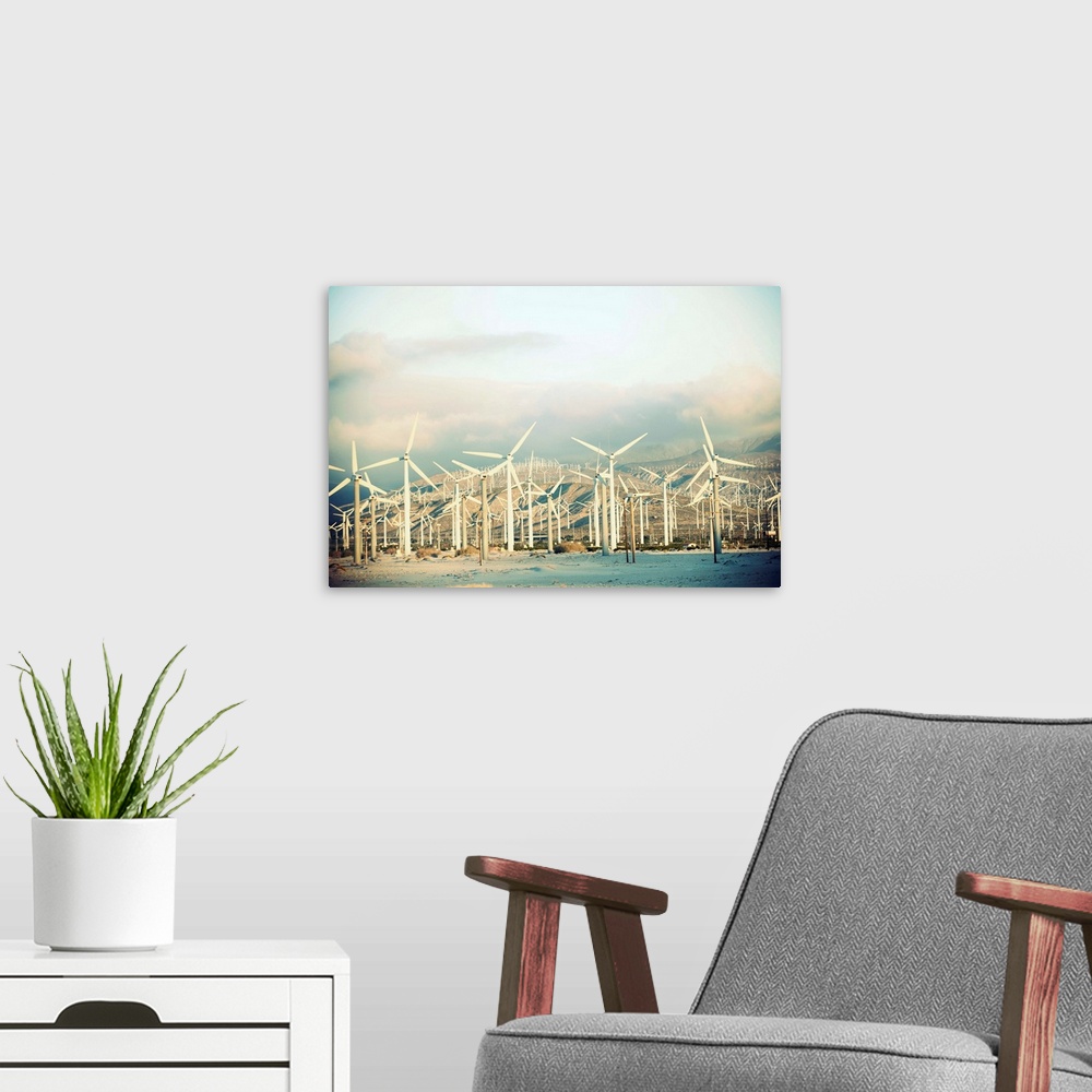 A modern room featuring Wind turbines with mountains in the background, Palm Springs, California