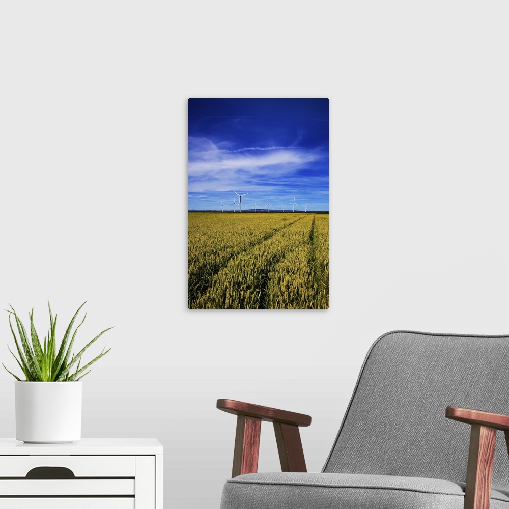 A modern room featuring Windfarm Beyond Wheat Field, Bridgetown, County Wexford, Ireland